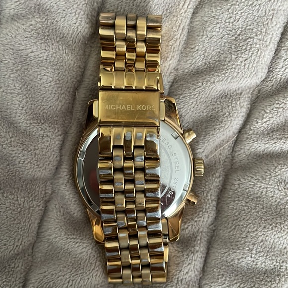 Woman’s Michael Kors gold color watch